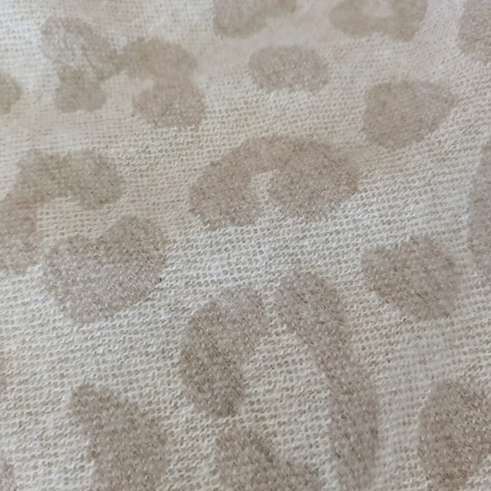 Cozy cheetah print throw. DKNY Pure. 50